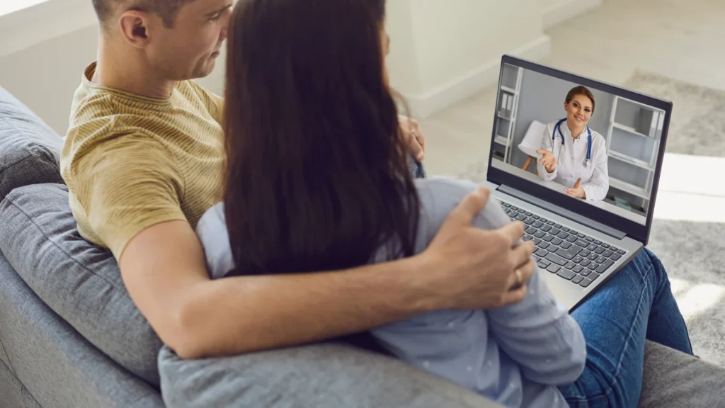 Clinician guiding a client through virtual Intensive Outpatient therapy